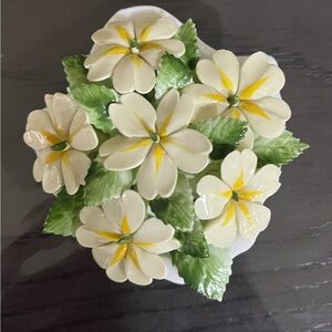 Royal Doulton seashell filled with flowers made from seashells